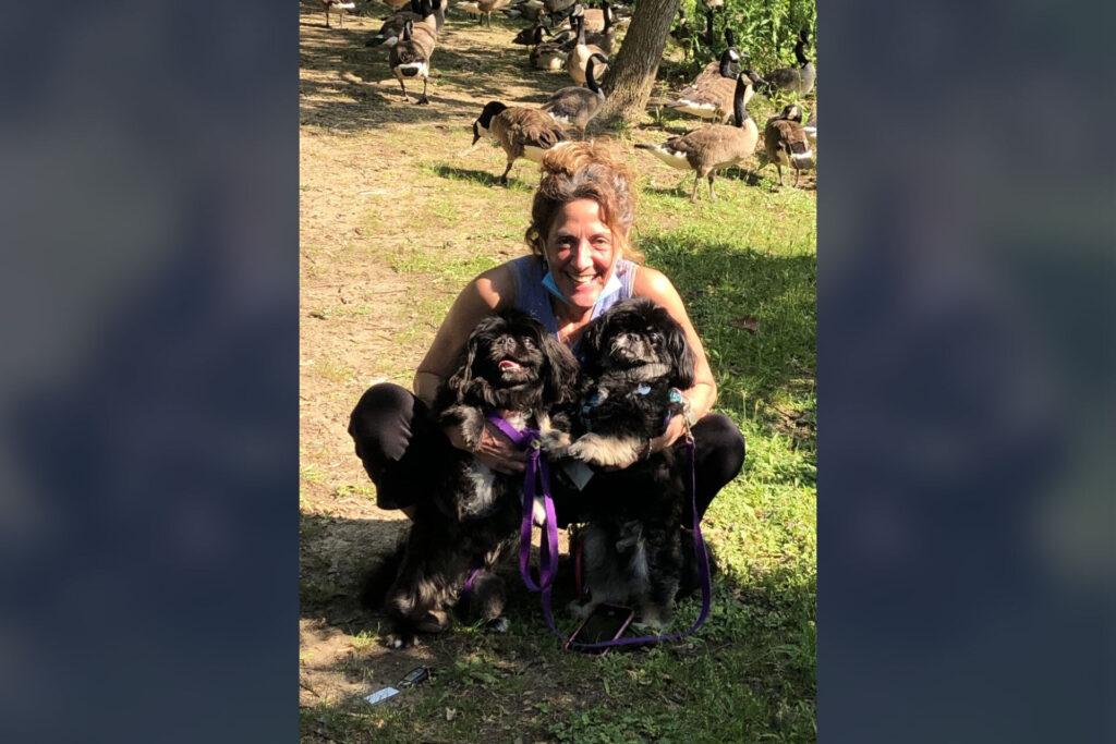 Jacqueline Canter in June at Haddon Lake Park with her dogs Frankie and Ernie, six weeks after being discharged from the rehabilitation center. (Courtesy of Jacqueline Canter)