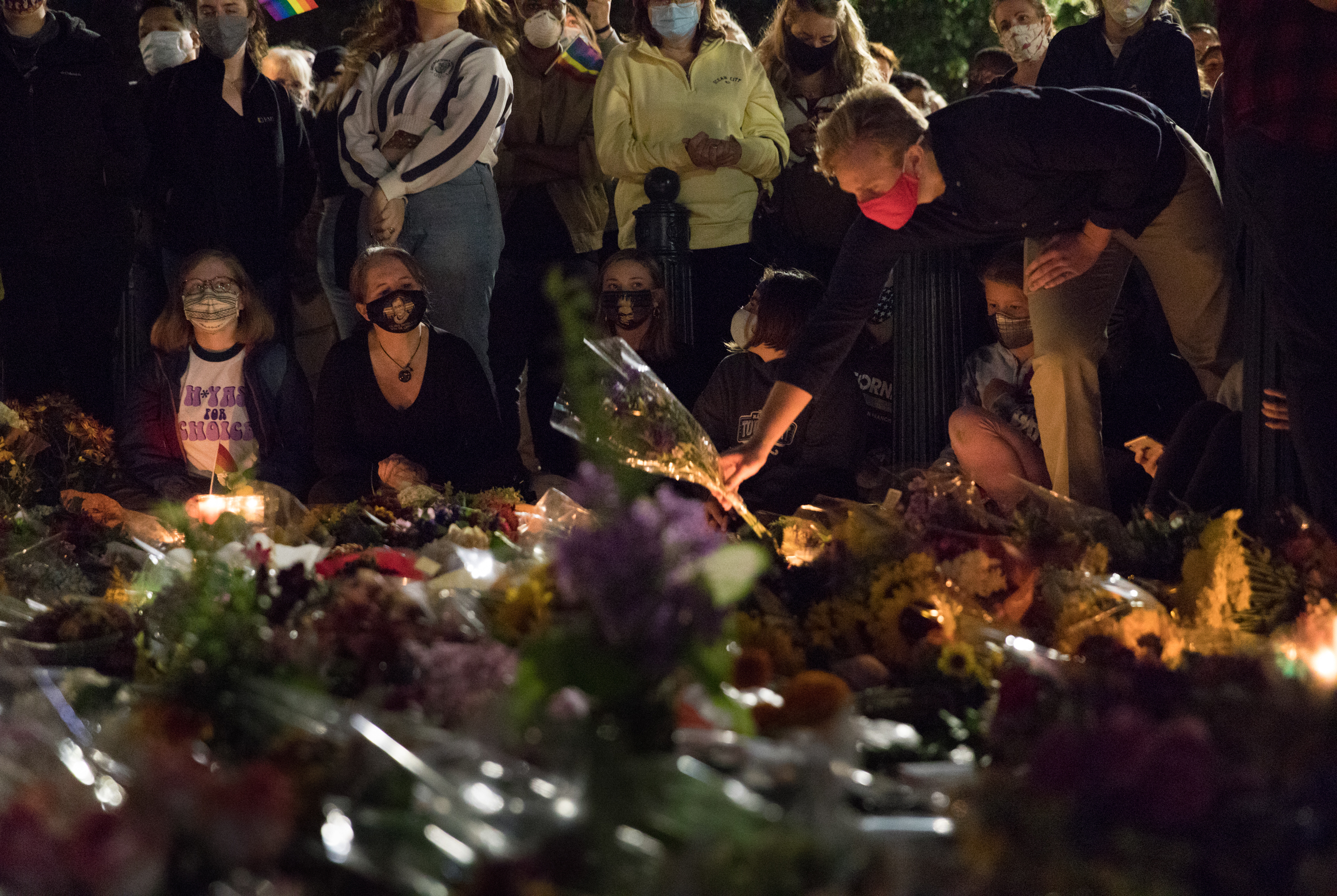 People gather to pay their respects for Ruth Bader Ginsburg at the Supreme Court.