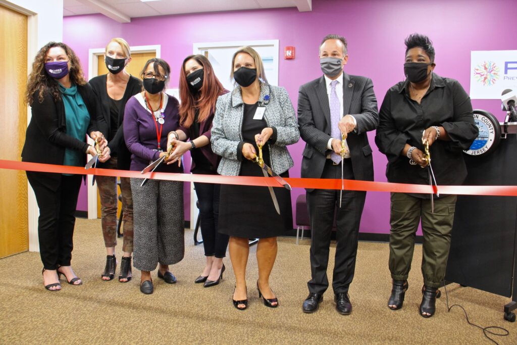 2020 09 22-e lee-scott coffina felicia hopson-westampton nj-addiction recovery center Burlington County officials, including (from right) County Commissioner Director Felicia Hopson and Prosecutor Scott Coffina, cut the ribbon to open the county's new addiction Recovery Center in Westampton, N.J.. (Emma Lee/WHYY)