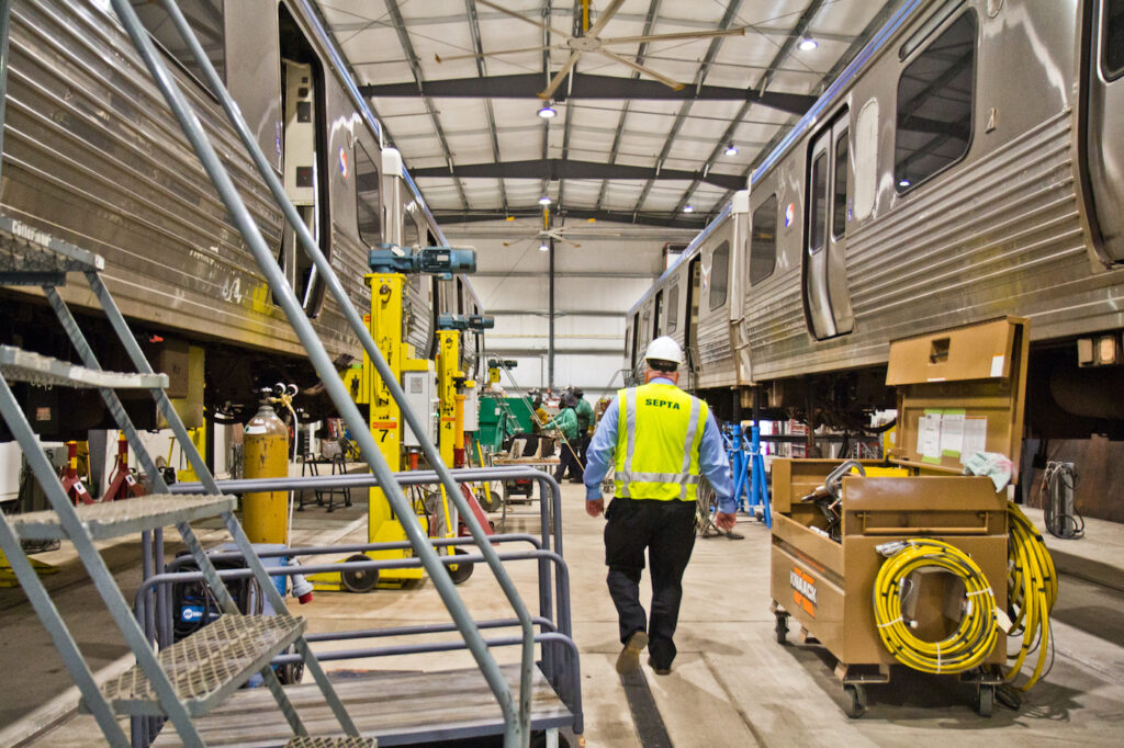 2020-1-30-k-paynter-septa-el-car-fix-4-r A SEPTA worker walks through the 69th Street SEPTA repair shop