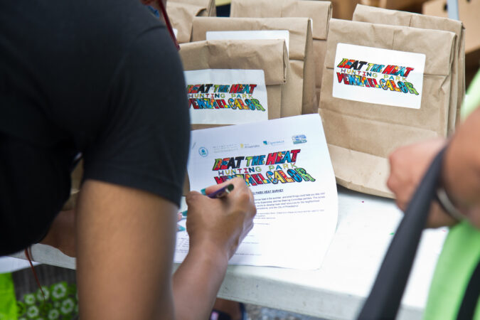 Hunting Park residents were asked to fill out a heat survey at a food pick-up at the Lenfest Center