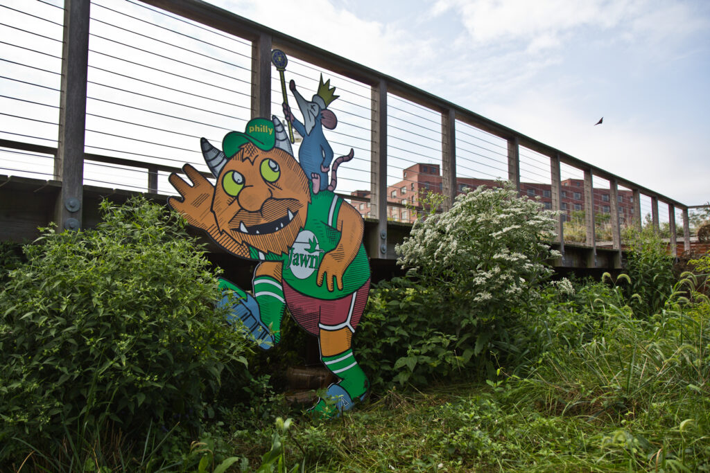 2020 9 11 k paynter navy yard art-9 A troll by artist Kid Hazo under a footbridge at Philadelphia’s Navy Yard. (Kimberly Paynter/WHYY)