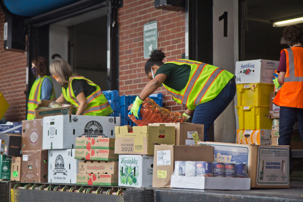 2020 9 11 k paynter philadbundance-2 Philadbundance staff and volunteers were joined by DHS employees Friday to help load trucks of Philadelphia food for organizations in need. (Kimberly Paynter/WHYY)