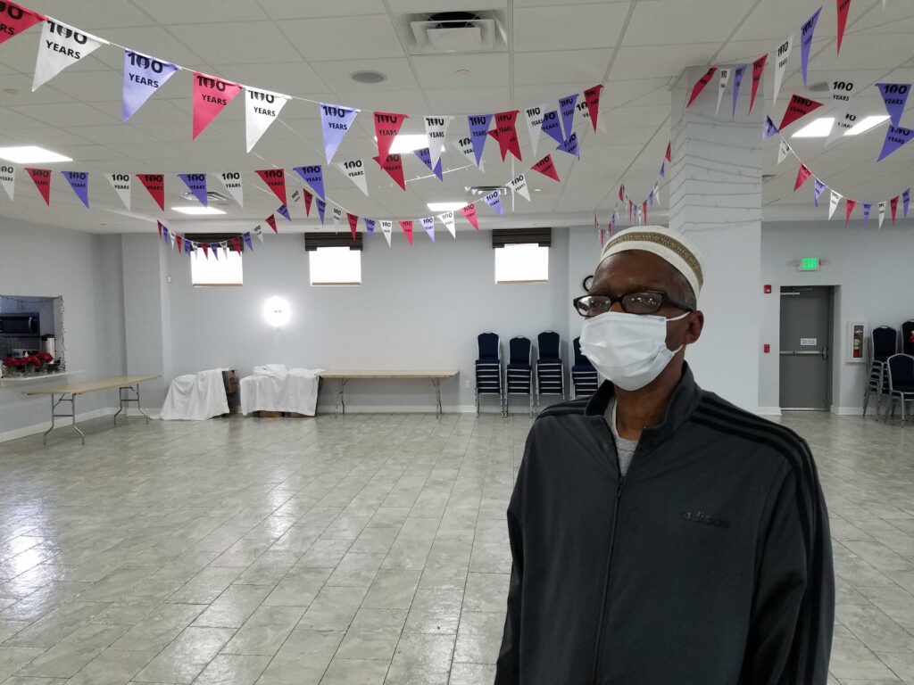 20200912_112601 Rafiyq Friend in the community room of the Ahmadiyya mosque in North Philly, where the blood drive will happen Sunday. (Peter Crimmins/WHYY)