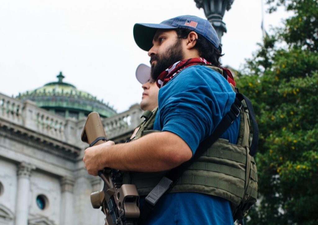 An attendee holds his weapon at the Rally to Protect Your Right to Keep and Bear Arms at the state Capitol on September 29, 2020. (Kate Landis/WITF)