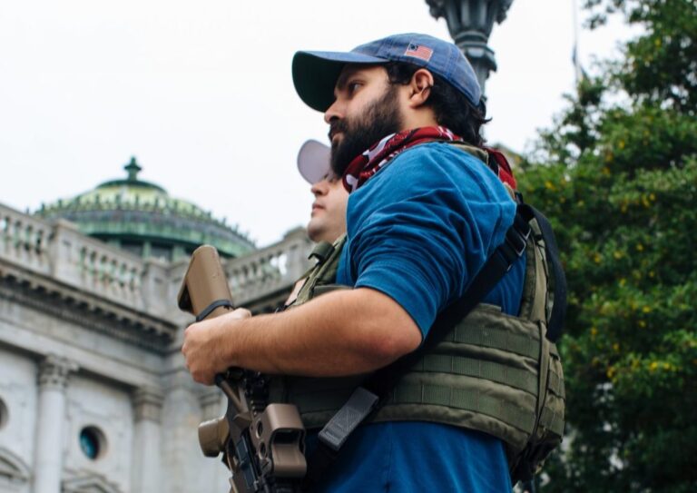 An attendee holds his weapon at the Rally to Protect Your Right to Keep and Bear Arms at the state Capitol on September 29, 2020. (Kate Landis/WITF)
