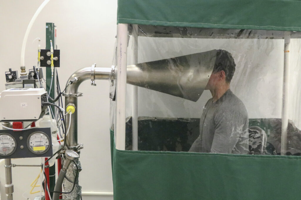 Virus Outbreak Airborne Spread This February 2018 photo provided by the University of Maryland School of Public Health shows The Gesundheit II machine in Dr. Donald Milton's Public Health Aerobiology, Virology, and Exhaled Biomarker Laboratory at the University of Maryland School of Public Health in College Park, Md. (University of Maryland School of Public Health via AP)
