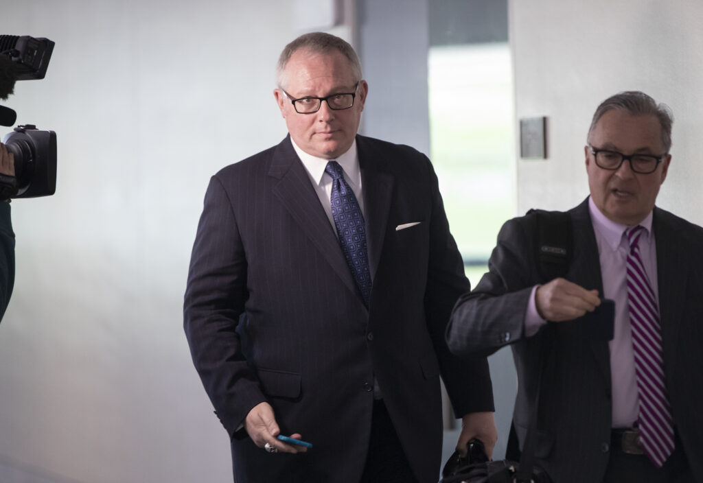 Michael Caputo, Dennis C. Vacco Former Trump Campaign official Michael Caputo, center, joined by his attorney Dennis C. Vacco, right, leaves after a three-hour interview by Senate Intelligence Committee staff that is investigating Russian meddling in the 2016 presidential election, on Capitol Hill in Washington, Tuesday, May 1, 2018. (AP Photo/J. Scott Applewhite)