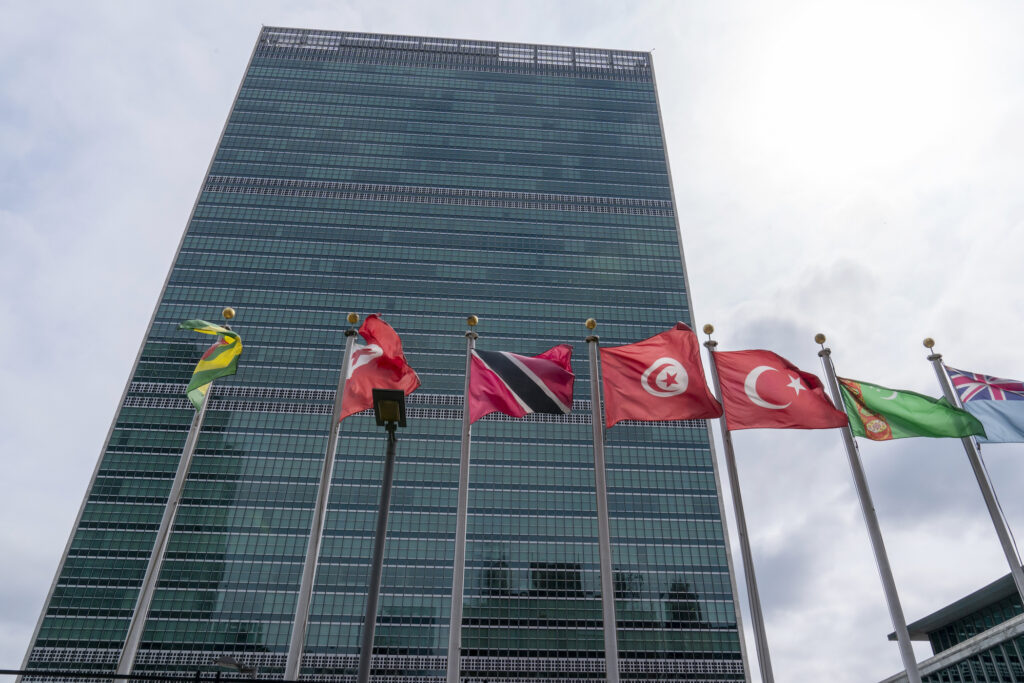 United Nations General Assembly Member state flags fly outside the United Nations headquarters, Friday, Sept. 18, 2020, in New York. Security measures have been downscaled outside the United Nations ahead of this year’s General Assembly. As the COVID-19 pandemic continues to wreak havoc across the globe, the annual meeting of member states has been scaled back, with the majority of delegates addressing the assembly from remote locations. (AP Photo/Mary Altaffer)