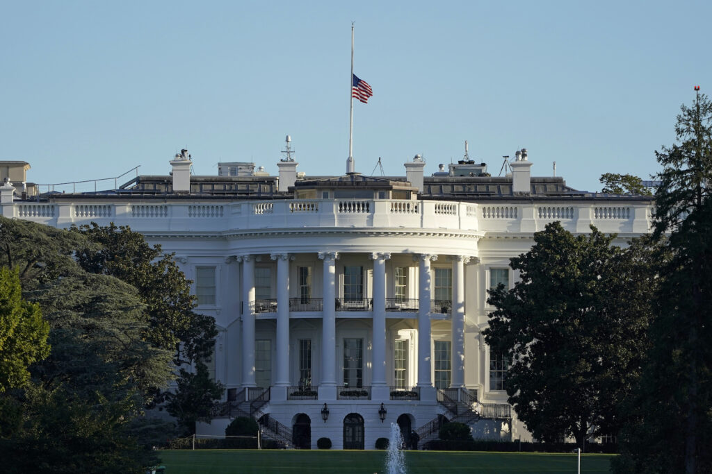 Supreme Court Ginsburg Reaction An American flag flies at half-staff over the White House in Washington, Saturday, Sept. 19, 2020. (AP Photo/Patrick Semansky)