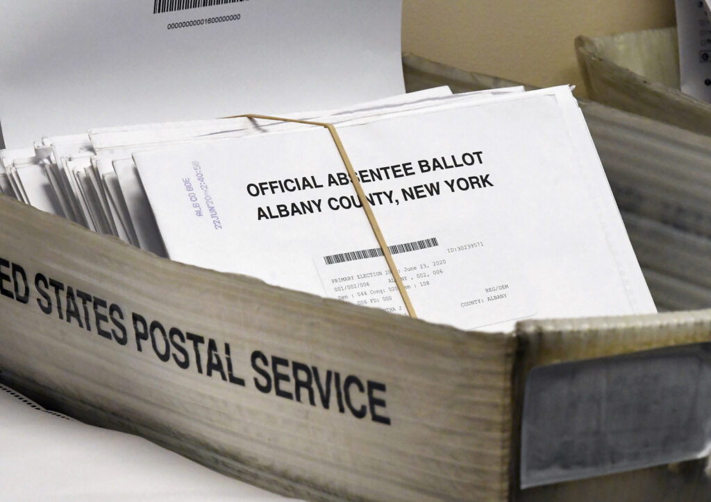 Postal Service Lawsuit Box of absentee ballots waiting to be counted at the Albany County Board of Elections, Tuesday, June 30, 2020, in Albany, N.Y. (AP Photo/Hans Pennink)
