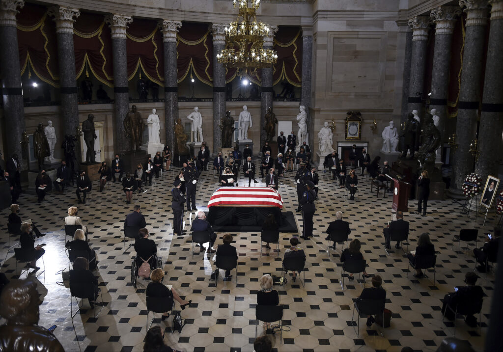 Supreme Court Ginsburg Lying in State A U.S. Capitol Police honor guard surrounds the flag-draped casket of Justice Ruth Bader Ginsburg as lies in state in Statuary Hall of the U.S. Capitol, Friday, Sept. 25, 2020 in Washington. (Olivier Douliery/Pool via AP)