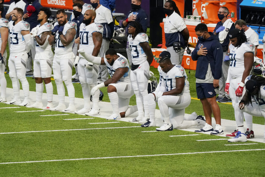 Titans Vikings Football Members of the Tennessee Titans take part in the national anthem before an NFL football game against the Minnesota Vikings, Sunday, Sept. 27, 2020, in Minneapolis. (AP Photo/Jim Mone)