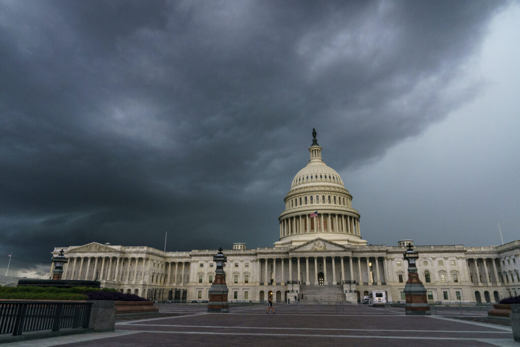 Election 2020 Russia Race Stormy weather moves toward the Capitol in Washington, Friday, Aug. 28, 2020. (AP Photo/J. Scott Applewhite)