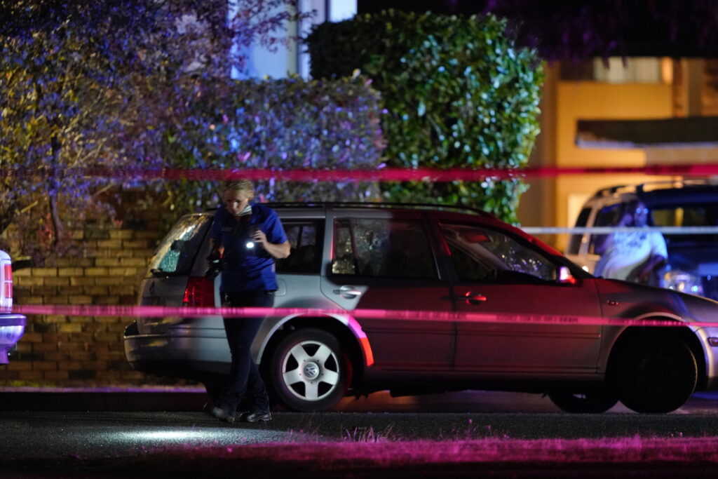 Portland Suspect Killed An investigator works at a scene where a man suspected of fatally shooting a supporter of a right-wing group in Portland, Ore., last week was killed as investigators moved in to arrest him in Lacey, Wash., Thursday, Sept. 3, 2020. Michael Reinoehl, 48, was killed as a federal task force attempted to apprehend him in Lacey, a senior Justice Department official said. (AP Photo/Ted Warren)