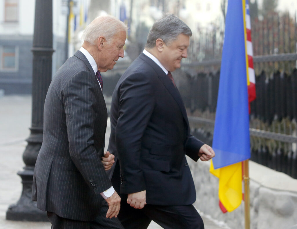 Joe Biden, Petro Poroshenko U.S. Vice President Joe Biden, left, and Ukrainian President Petro Poroshenko go for talks during Biden's visit in Kiev, Ukraine, Monday, Jan. 16, 2017. (AP Photo/Efrem Lukatsky)