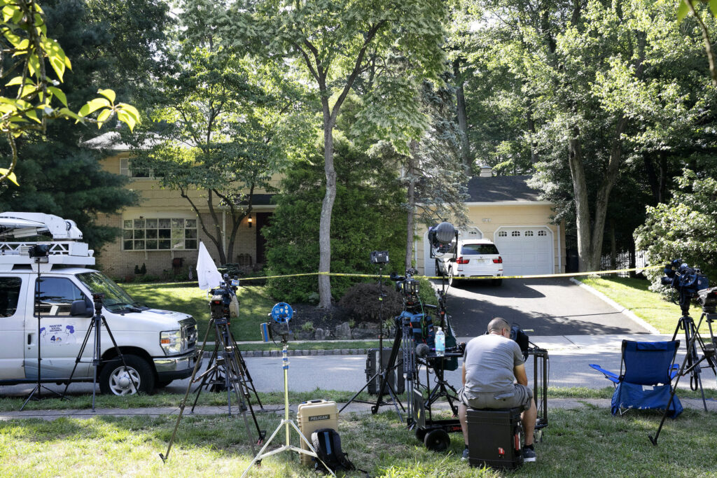 News media is set up in front of the home of U.S. District Judge Esther Salas News media is set up in front of the home of U.S. District Judge Esther Salas
