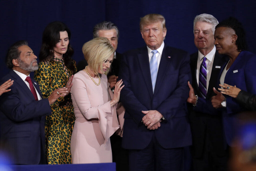 Faith leaders pray with President Donald Trump Faith leaders pray with President Donald Trump
