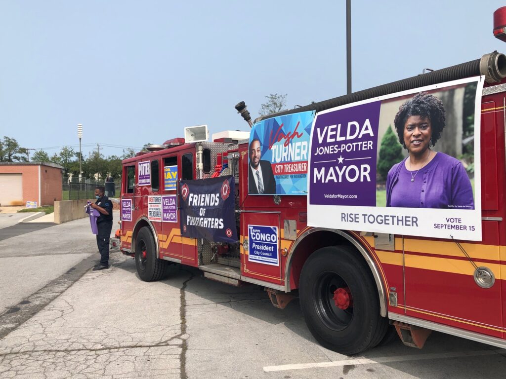 IMG_9637 Members of the Wilmington firefighters' union came out in force for mayoral hopeful Velda Jones-Potter and other city candidates Tuesday. (Cris Barrish/WHYY)