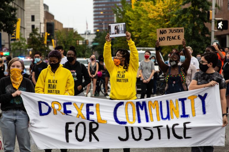 Protesters march up 33rd Street in Philadelphia’s University City chanting “Justice for Breonna Taylor.” (Kimberly Paynter/WHYY)