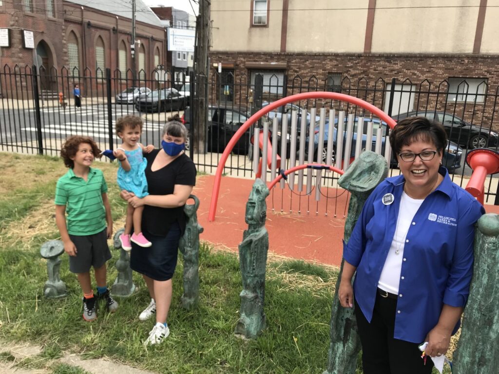 Kathryn Ott Lovell, commissioner at Philadelphia Parks and Recreation (far right), Gathered at East Passyunk Community Center with (left to right) Max, Ruby, and Kim Kindelsperger.