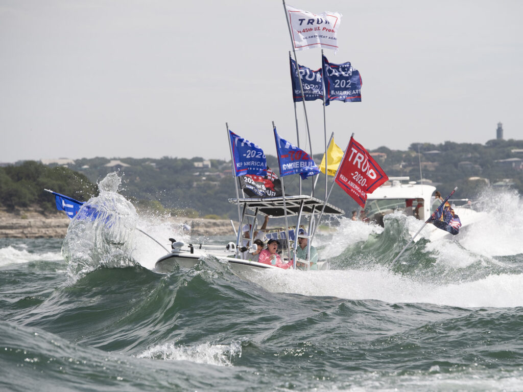 Trump Boat Rally Boats Sink Boaters flying flags honoring President Trump crowded Lake Travis in Texas on Saturday. Although this boat did not capsize, a spokesperson for the Travis County Sheriff's Office said