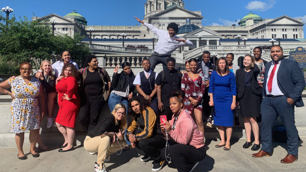 Members of the Juvenile Law Center’s Youth Fostering Change pose in Harrisburg in better days