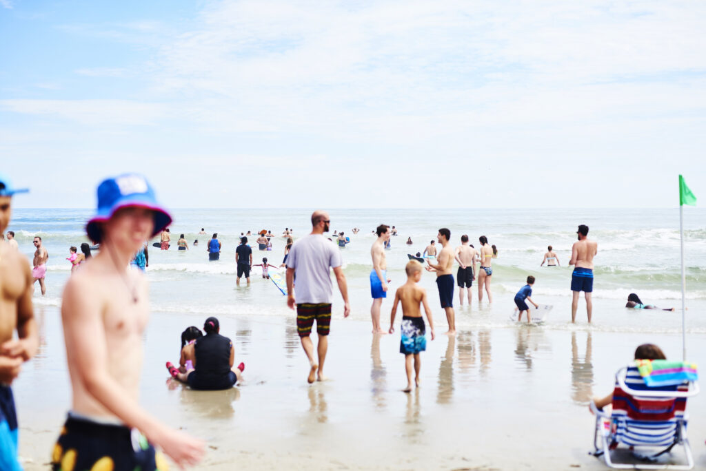 People roamed the beach in Ocean City, N.J, at the start of August. As Labor Day weekend arrives, Dr. Anthony Fauci, director of the National Institute of Allergy and Infectious Diseases, says Americans should remain vigilant to avoid another surge in coronavirus infection rates. People roamed the beach in Ocean City, N.J, at the start of August. As Labor Day weekend arrives, Dr. Anthony Fauci, director of the National Institute of Allergy and Infectious Diseases, says Americans should remain vigilant to avoid another surge in coronavirus infection rates. (Gabby Jones/Bloomberg via Getty Images)