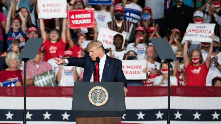 President Trump addresses the crowd during a campaign rally Tuesday at Smith Reynolds Airport in Winston Salem, N.C. (Sean Rayford/Getty Images)