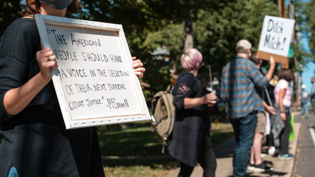 Protesters Demonstrate Against Sen. Mitch McConnell In Wake Of Supreme Court Justice Ruth Bader Ginsburg’s Death Protesters Demonstrate Against Sen. Mitch McConnell In Wake Of Supreme Court Justice Ruth Bader Ginsburg's Death