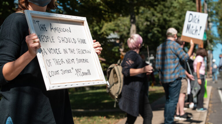 Protesters Demonstrate Against Sen. Mitch McConnell In Wake Of Supreme Court Justice Ruth Bader Ginsburg's Death