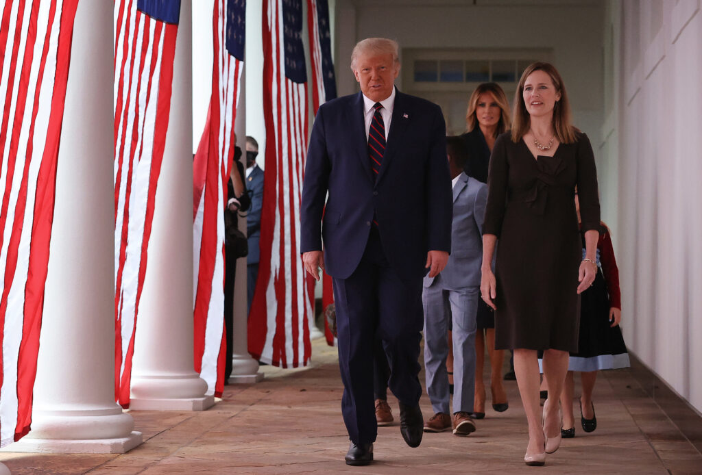 President Trump and Supreme Court nominee Amy Coney Barrett walk along the Rose Garden Colonnade on Saturday. The focus on the court just weeks before the election could help energize conservatives in key states. President Trump and Supreme Court nominee Amy Coney Barrett walk along the Rose Garden Colonnade on Saturday. The focus on the court just weeks before the election could help energize conservatives in key states.