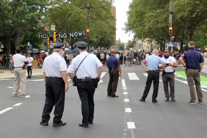 Police divert traffic around the Parkway homeless encampment