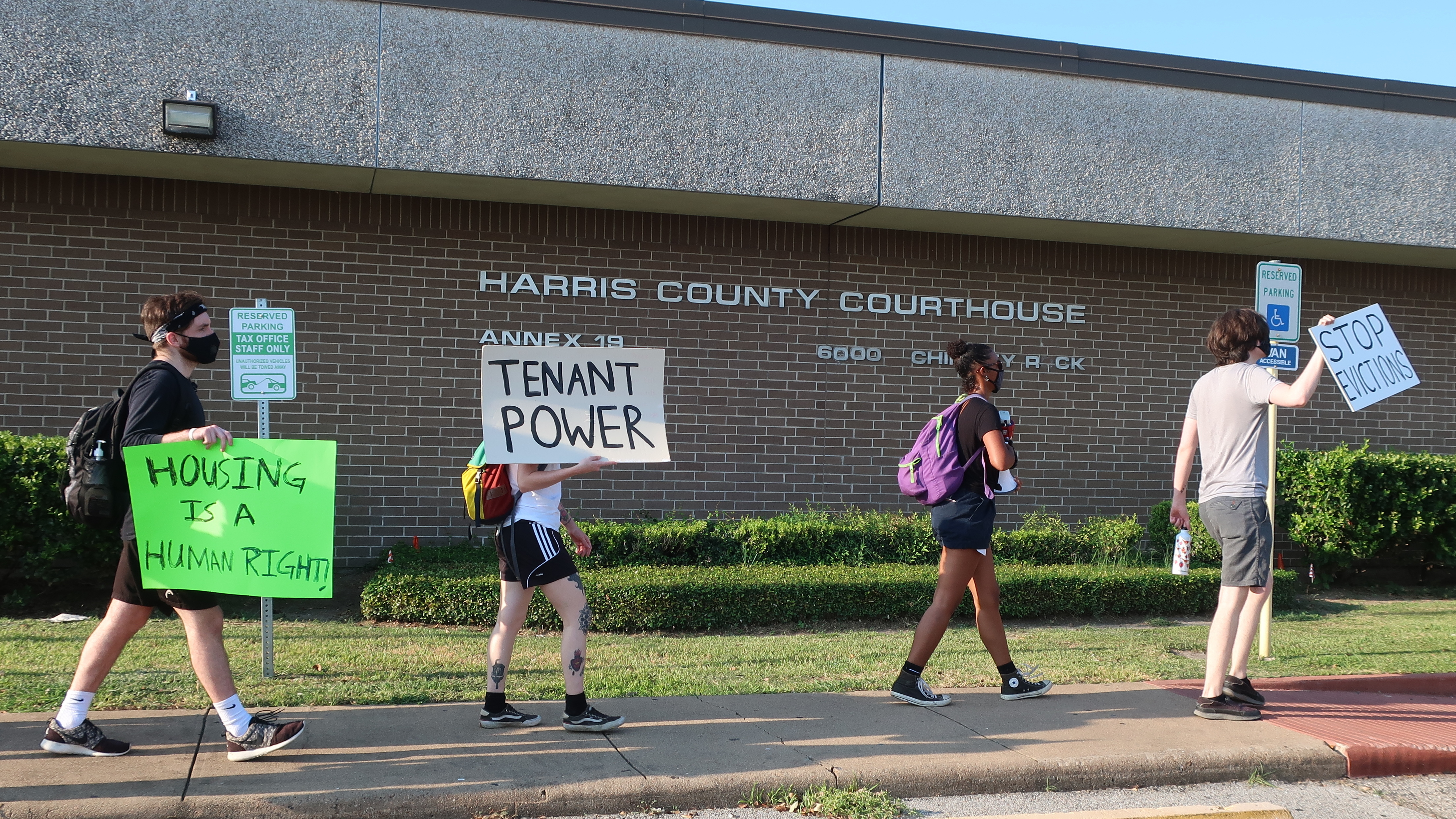 Protesters march Aug. 21 outside a courthouse in Houston, where evictions are continuing despite a moratorium ordered recently by the CDC