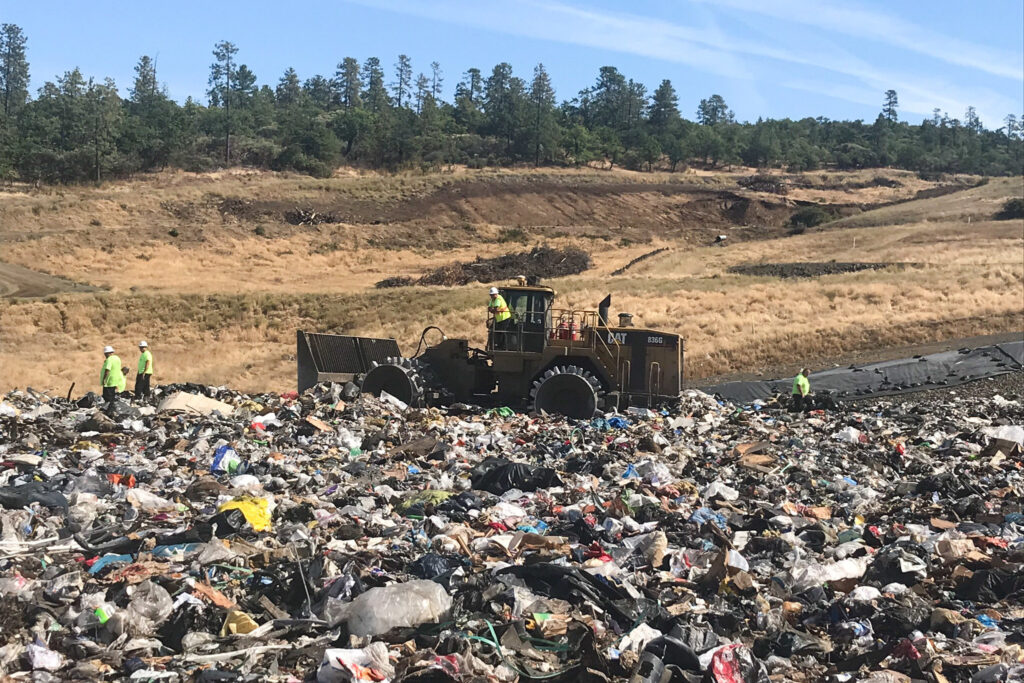 Landfill workers bury all plastic except soda bottles and milk jugs at Rogue Disposal & Recycling in southern Oregon. Landfill workers bury all plastic except soda bottles and milk jugs at Rogue Disposal & Recycling in southern Oregon. (Laura Sullivan/NPR)
