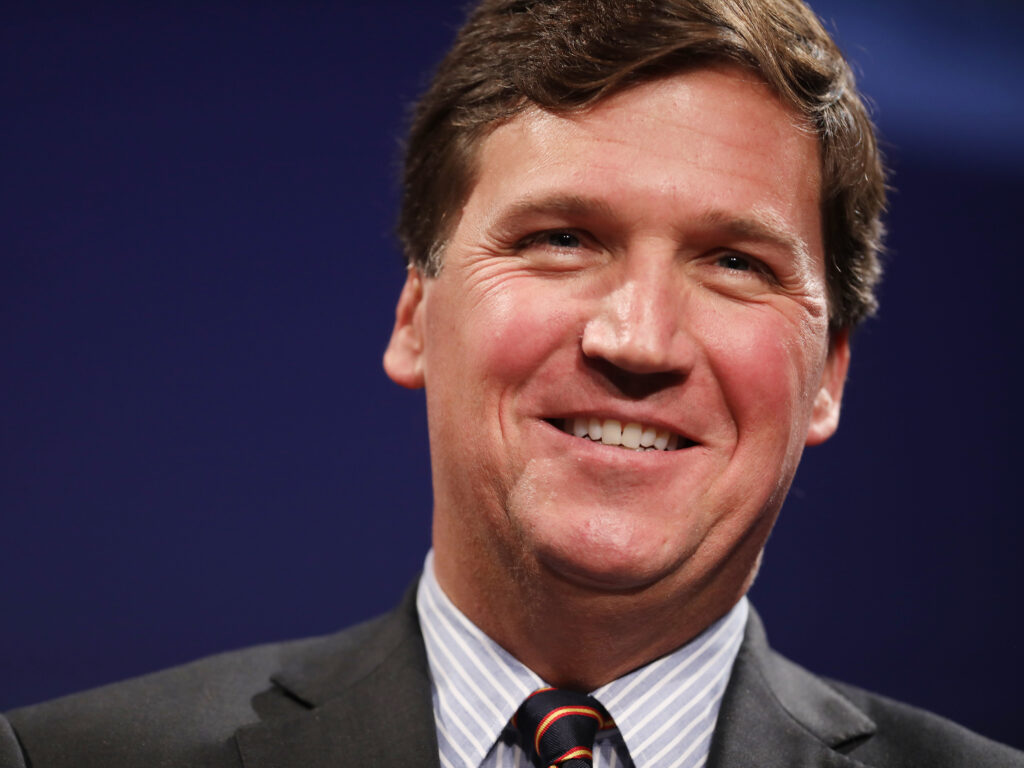 Fox News host Tucker Carlson “is not ‘stating actual facts’ about the topics he discusses and is instead engaging in ‘exaggeration’ and ‘non-literal commentary,'” wrote U.S. District Judge Mary Kay Vyskocil. Fox News host Tucker Carlson
