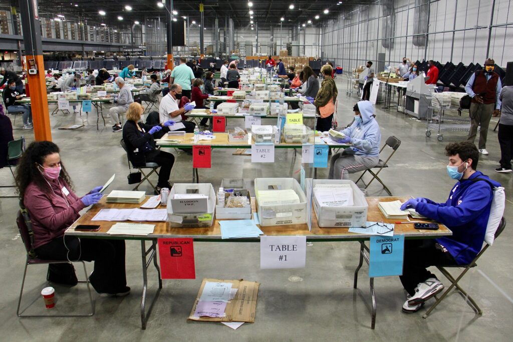 2020 10 28-e lee-blackwood nj camden county election center-mail in ballot counting inspectors Camden County election workers, paired by party, open and inspect mail ballots at Camden County Elections and Archive Center