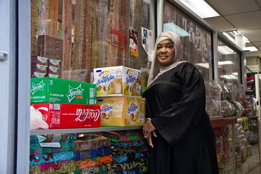2020 10 28 k paynter first time immigrant voters-5 Satte Hoffe at her store in West Philadelphia. She’s a Liberian immigrant who said she’s voting because she fears a civil war. (Kimberly Paynter/WHYY)