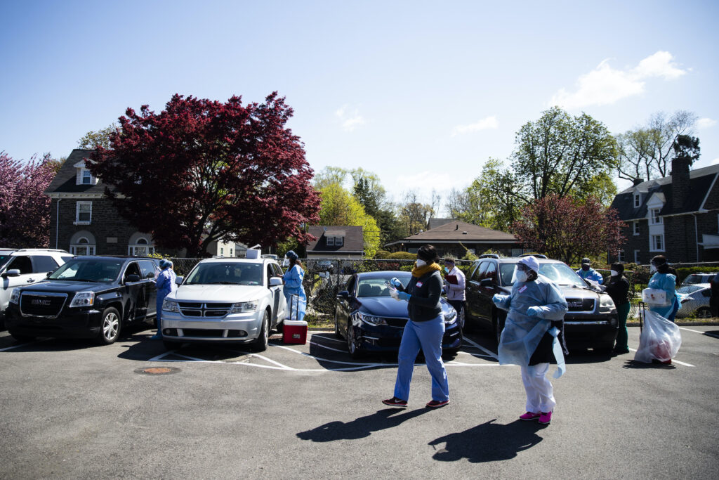 Virus Outbreak Pennsylvania Daily Life People in their vehicles receive COVID-19 tests at a barrier free location outside the Pinn Memorial Baptist Church in Philadelphia, Wednesday, April 22, 2020. (AP Photo/Matt Rourke)