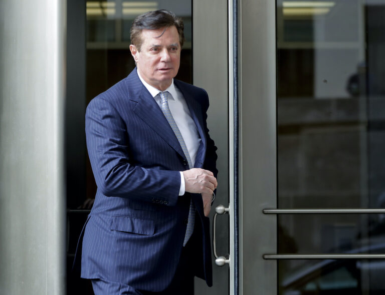 Paul Manafort, President Donald Trump's former campaign chairman, leaves the federal courthouse in Washington, Wednesday, Feb. 14, 2018, in Washington.(AP Photo/Pablo Martinez Monsivais)