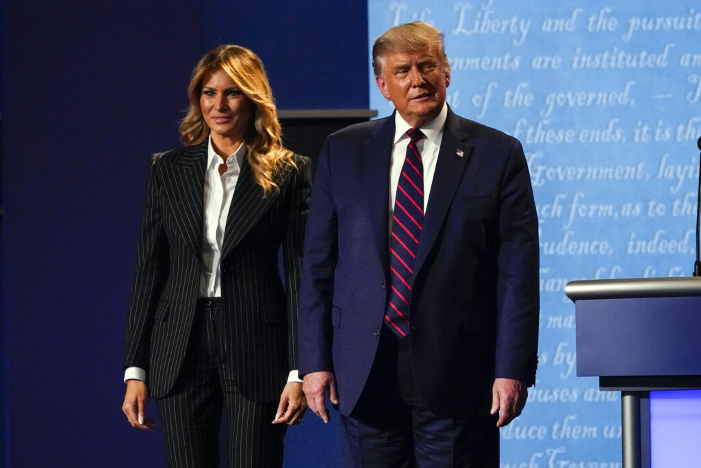 Donald Trump, Melania Trump President Donald Trump stands on stage with first lady Melania Trump after the first presidential debate with Democratic presidential candidate former Vice President Joe Biden Tuesday, Sept. 29, 2020, at Case Western University and Cleveland Clinic, in Cleveland, Ohio. (AP Photo/Julio Cortez)