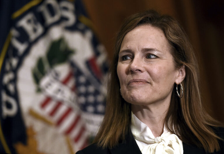 Judge Amy Coney Barrett, President Donald Trumps nominee for the US Supreme Court, looks on during a meeting with Senator Roger Wicker (R-MS) on Capitol Hill in Washington, October, 1, 2020. (Olivier Douliery/Pool via AP)