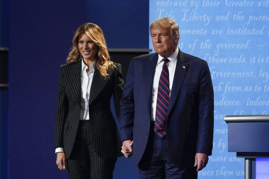 Donald Trump, Melania Trump President Donald Trump and first lady Melania Trump hold hands on stage after the first presidential debate at Case Western University and Cleveland Clinic, in Cleveland, Ohio, Sept. 29, 2020. (AP Photo/Julio Cortez, File)