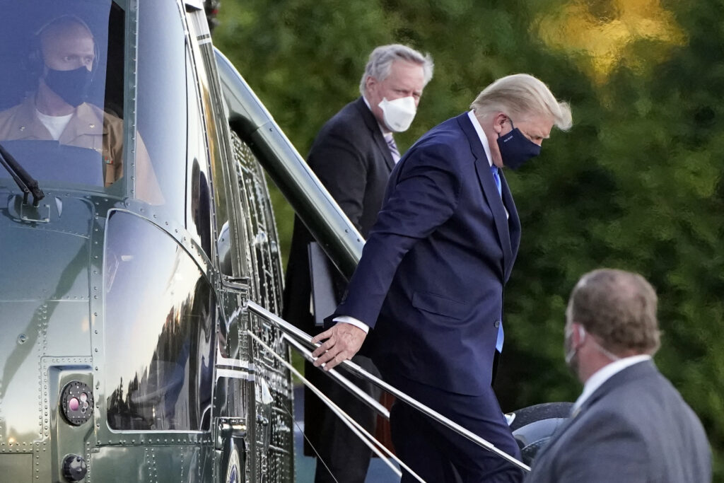 Donald J. Trump President Donald Trump arrives at Walter Reed National Military Medical Center, in Bethesda, Md., Friday, Oct. 2, 2020, on Marine One helicopter after he tested positive for COVID-19. (AP Photo/Jacquelyn Martin)