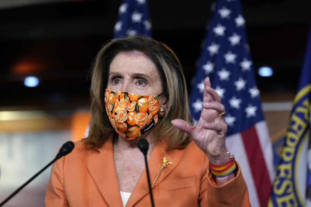 Nancy Pelosi Nancy Pelosi wearing a face mask