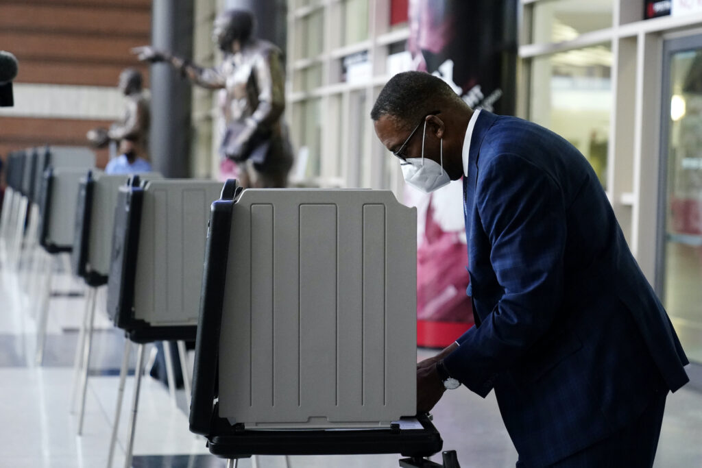 Election 2020 Voting Pennsylvania Philadelphia City Council President Darrell Clarke fills out his ballot at the opening of a satellite election office at Temple University’s Liacouras Center, Tuesday, Sept. 29, 2020, in Philadelphia. (AP Photo/Matt Slocum)