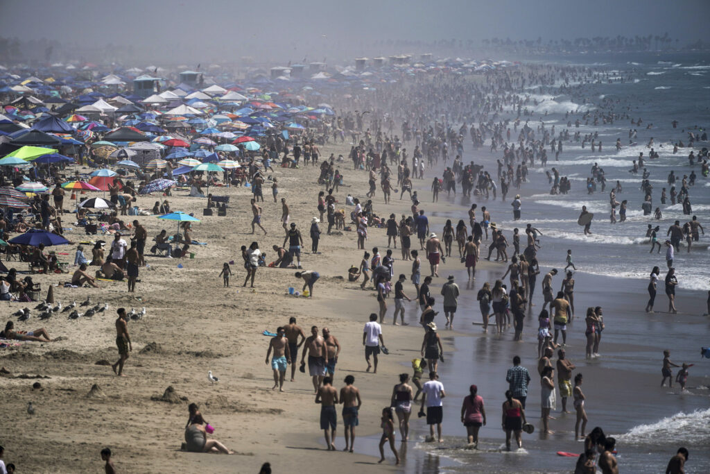 Hot September People crowd the beach in Huntington Beach, Calif., Saturday, Sept. 5, 2020. (AP Photo/Jae C. Hong)