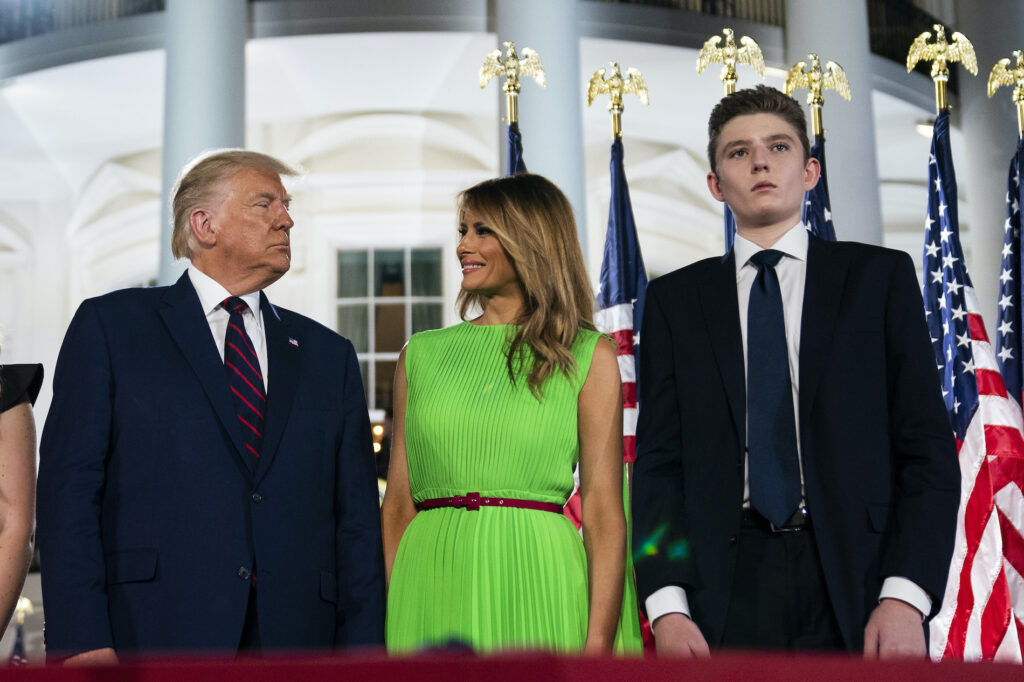 Barron Trump, Donald Trump, Melania Trump In this Aug. 27, 2020 file photo, Barron Trump right, stands with President Donald Trump and first lady Melania Trump on the South Lawn of the White House on the fourth day of the Republican National Convention in Washington. (AP Photo/Evan Vucci)