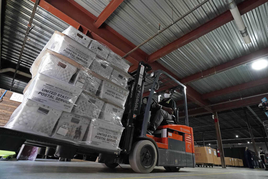Election 2020 Postal Service Delivery In this Sept. 3, 2020, file photo, a forklift operator loads absentee ballots for mailing at the Wake County Board of Elections as preparations for the upcoming election are ongoing in Raleigh, N.C. (AP Photo/Gerry Broome)