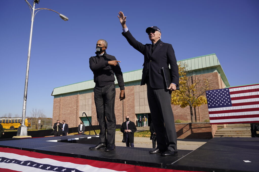 Joe Biden, Barack Obama Democratic presidential candidate former Vice President Joe Biden, right, and former President Barack Obama greet each other at a rally at Northwestern High School in Flint, Mich., Saturday, Oct. 31, 2020. (AP Photo/Andrew Harnik)